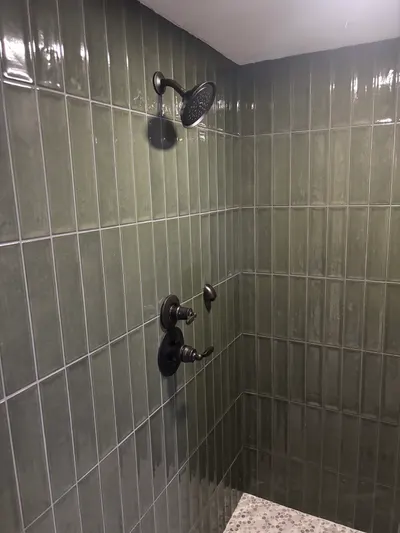 Install new shower head during a fixture installation.