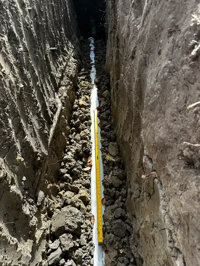 Replace deep drain lines during sewer line work.