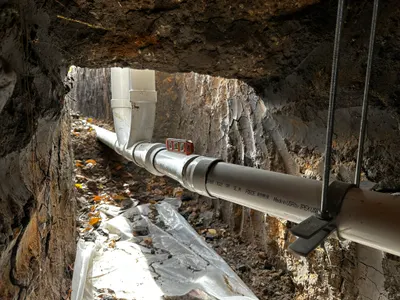 Under slab sewer line replacement during sewer line work.