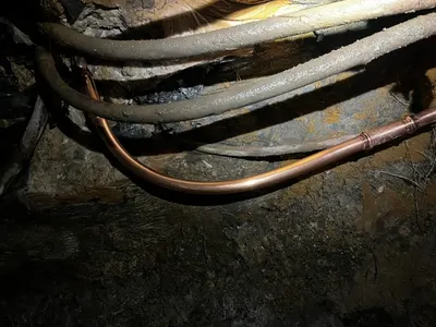 Replace copper pipe under slab during a slab leak repair.