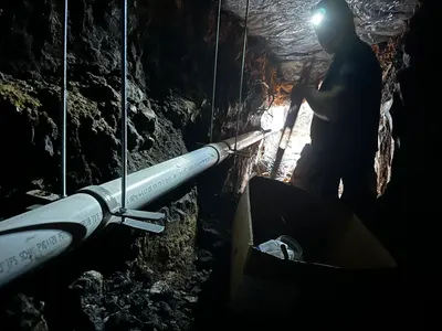 Tunnel under house shovel during a tunneling job beneath a Dallas-area home.