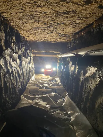 Under slab tunnel during a tunneling job beneath a Dallas-area home.