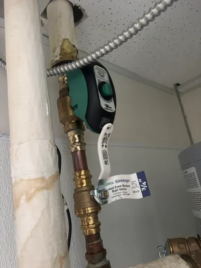 New valve water heater during a water heater installation.