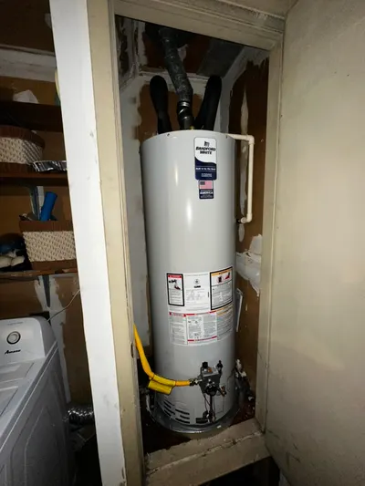 Water heater installation closet during a water heater installation.