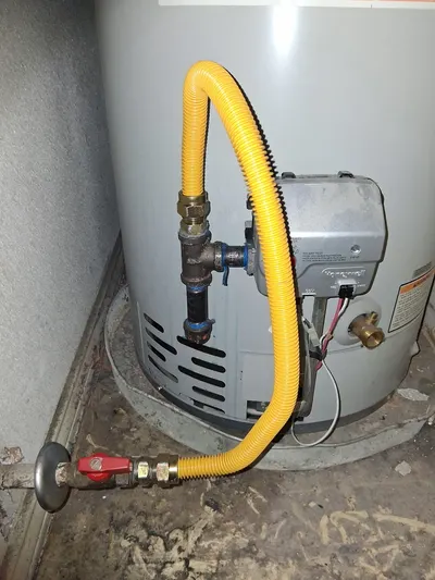 Install new valve gas water heater during a water heater installation.