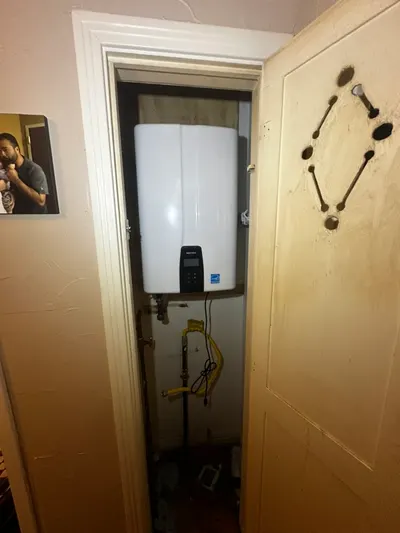 Install tankless water heater during a water heater installation.