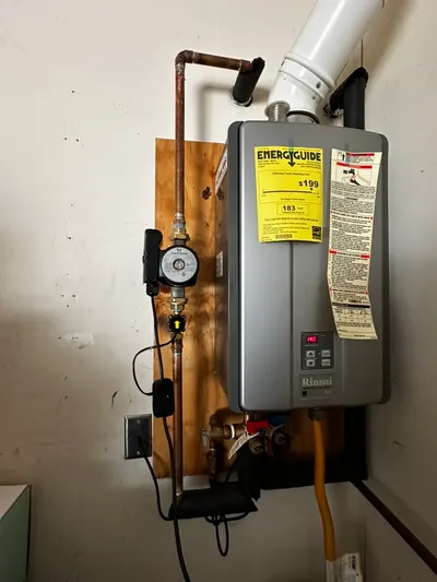 Install tankless water heater during a water heater installation.